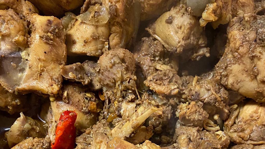 Curry Chicken · Serves with white rice rice and peas plantains and vegetable