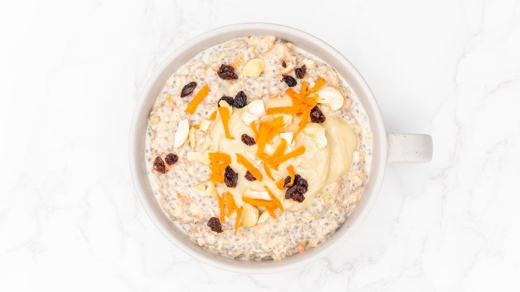 Cashew Carrot Cake (10 Oz Jar) · Dairy free, vegan, gluten free. GMO-free.  Cashew butter, raisins, grated carrots, and cinnamon over a blend of organic rolled oats and chia seeds soaked overnight in cashew milk.