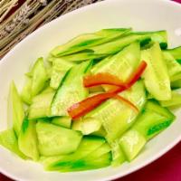 拍拌黄瓜 / Cucumber Salad · Mixed with light garlic vinaigrette dressing.