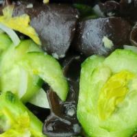 醋溜黃瓜木耳片 Cucumber & Black Fungus Salad · Julienne bell peppers and onions and garnished with fresh bird's eye chilis mixed in house v...