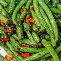 干煸四季豆 / Sichuan String Beans · Spicy.Dried chilies, fermented mustards, hot & spicy peppercorn sauce.