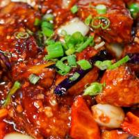 鱼香茄子 / Sichuan Eggplant · Spicy. Bell peppers, onions, & hot & spicy Sichuan garlic sauce.