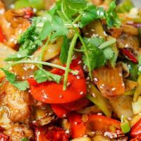 干锅肥肠 / Griddle Pork Intestines · Celery, onion, red & green bell peppers, hot & spicy Sichuan pepper seasoning