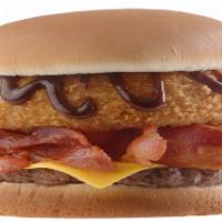 Rodeo Burger · Our beef patty with cheese and bacon then topped with an onion rings and BBQ sauce