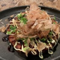 Okonomiyaki · Japanese style pancake, mayo, bonito.
