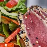Ahi Salad · sesame-seared ahi, mixed greens, red bell peppers, pickled ginger, cilantro, miso-ginger vin...