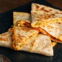 Classic Quesadilla · Vegetarian option. Crisp flour tortilla filled with cheddar and jack cheese, topped with cil...