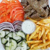 Gyros Plate · Comes with rice, salad, hummus, one pita bread, and sauce.