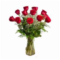 Dozen Roses · Beautiful vase arrangement with a dozen roses and mixed greenery.