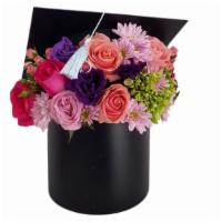 Graduation Flower Box · Gorgeous graduation themed flower box. 
Flowers may vary depending on availability