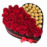 Premium Roses And Chocolate · Heart shaped box filled with Red roses and Ferrero Rochers. Flower Box Color may vary betwee...