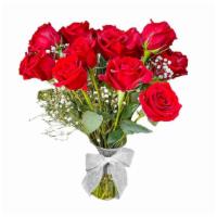 24 Red Roses · Flowers and/or vase/container may vary depending on the season and availability.