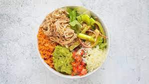 Vegetarian Burrito Bowl · Fajita onions and peppers, guacamole, spanish rice, black beans, pico de gallo, and shredded...