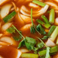 Tom-Yom Soup · Spicy herb soup infused with lemon grass, lime leave, galangal, onion & mushroom