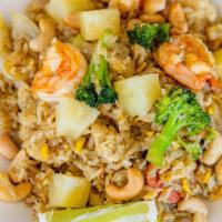 Pineapple Fried Rice · Jasmin rice with egg, pineapple, snow-peas, onion, carrot, broccoli, cashew with yellow curr...
