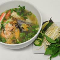 Seafood Pho · Homestyle Vietnamese noodle soup. Served with fresh bean sprouts, lime, jalapeño, basil and ...