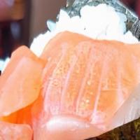Salmon Hand Roll · Consuming raw or undercooked meats, poultry, shellfish or eggs may increase your risk of foo...
