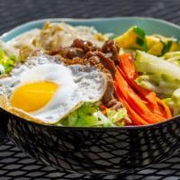 Korean Bibimbap · Choose beef, chicken, or tofu served over rice with korean gochujang and veggies