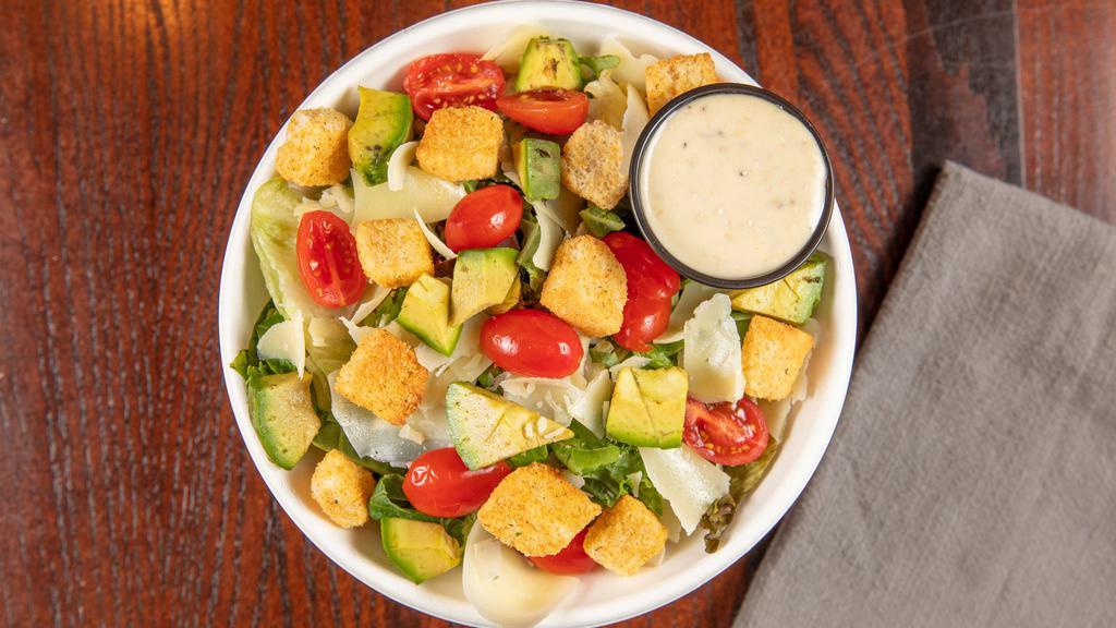 Avocado Caesar · Mixed greens, cherry tomatoes, diced avocado, croutons, parmesan cheese flakes and our house made Caesar dressing.