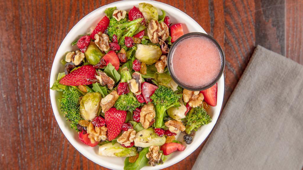 Roasted Vegetables & Fruit · Mixed greens, roasted brussels sprouts, roasted broccoli, dried cranberries, walnut halves, fresh strawberries, spinach and our house made raspberry vinaigrette.