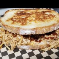 Grilla Chicken · Home-style slow-cooked chicken, shredded, grilled and placed in a grilla cheese sandwich wit...