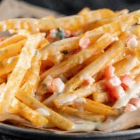 Grilla Fries · Fries, cheese, tomato, onion, grilla sauce. Choice of Chicken or Pork.