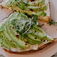 Avocado Toast · avocado, ricotta cheese, olive oil, and seasonings served on rustic white bread.