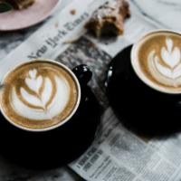 Latte · Double shot espresso and milk.