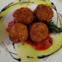 Arancini Carbonara · risotto balls with smokey bacon and egg in crisp panko crust, stuffed with aged sharp white ...