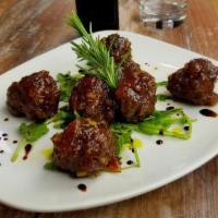 Polpetta Toscana · Tuscan herbed beef and sausage meatballs finished with spiced tomato jam
