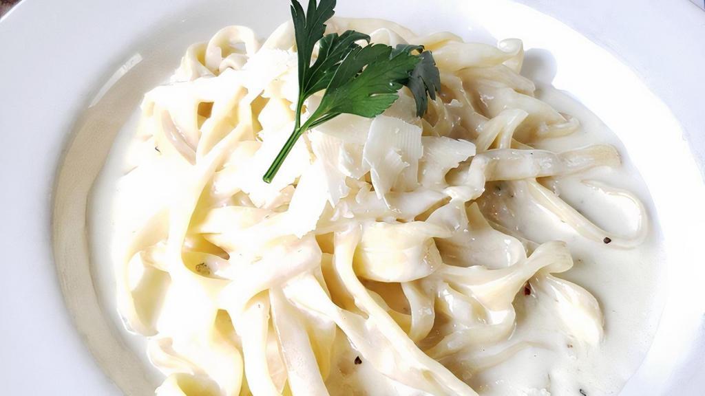 Cinque Formaggi · a cream sauce with a blend of romano, fontina, gorgonzola, asiago, and aged provolone over fettuccine