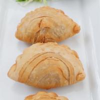 Curry Puff (4)  · crispy puff with choice of Veggie only or Chicken  stuffed with potatoes, onions and curry p...