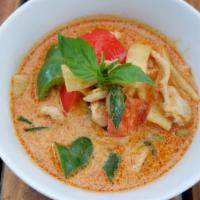 Red Curry · Medium spicy red curry with bamboo shoots, bell pepper, basil and Chinese eggplant