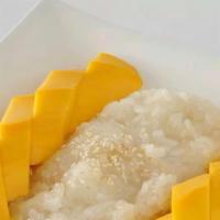 Mango Sticky Rice · Ripe mango with sweet coconut sticky rice.