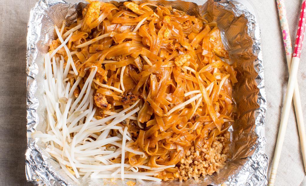 Pad Thai · Rice noodles, eggs, bean sprouts, and onions, stir-fried in our sweet and tangy sauce and topped with crushed peanuts.