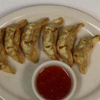 Gyoza (6) · Ground pork, ginger, onions, and celery wrapped in wonton and fried, served with sweet chili...