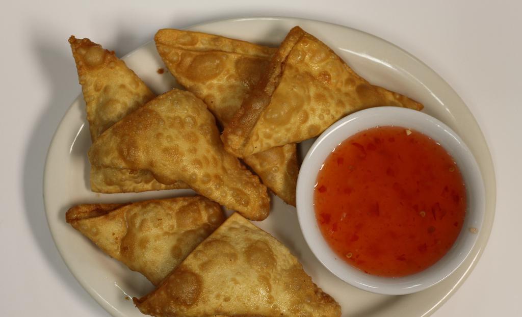 Cream Cheese Wonton (6) · Imitation crab meat and cream cheese in wonton wrap, served with sweet chili sauce.