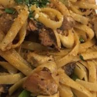 Wild Mushroom Spaghettini · Wild Mushrooms, Marsala Wine, Chicken Broth, Garlic, Pine Nuts, Parmesan, topped with shaved...