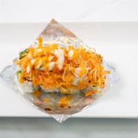 Dynamite - Baked Roll · IN: California Roll Base
TOP: Spicy Krab, Shrimp, White Fish
SAUCE: Spicy mayo
Baked roll ta...