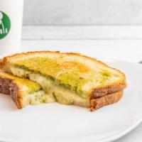Grilled Cheese And Pesto Sandwich · Sharp White Cheddar< Provolone and Cream Cheese and Pesto on Macrina Sourdough