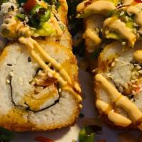 Avocado Shrimp Roll | Guamuchilito (12 Pieces) · Shrimp, crab, cucumber, cream cheese. On top: crab salad, avocado, sesame seeds, eel sauce (...