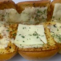 Cheezy Slider · Grilled Brioche, White American, Served with a Garlic Butter