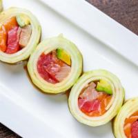 Naruto Roll · Salmon tuna and yellowtail avocado tobiko  wraped cucumber topped panzu  sauce.