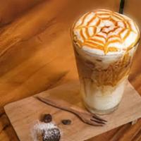 Caramel Macchiato - 24Oz. Cold · Steamed milk with vanilla flavored syrup, espresso and engulfed in a rich caramel topping