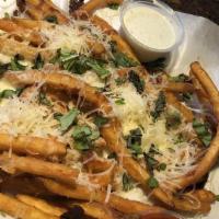 White Fries · a pile o’ fries topped with fresh garlic & herbs, parmesan, and a sprinkling of mozzarella.