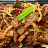 Mongolian Beef · Sliced beef tenderloin sautéed with onions, green onions, and bamboo shoots.