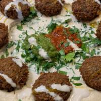 Hummus Falafel Plate (Vegan) · 8 falafel balls served on our delicious homemade hummus sprinkled with olive oil, parsley, b...