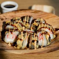 Super Salem Roll · Tempura roll with cream cheese and krabstik, topped with spicy mayo and eel sauce.