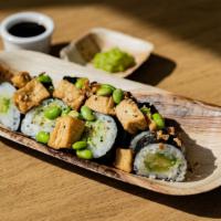 Vegan Pump Roll · Avocado, cucumber roll topped with our crispy tofu and edamame garlic mix.