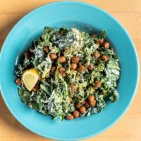 Zappatista Salad · Made without Gluten. A bed of romaine lettuce, topped with Smart black beans, Jack cheese, p...